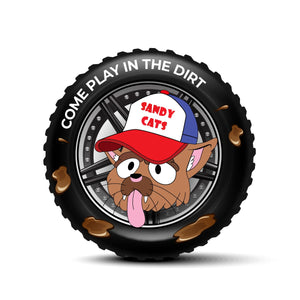 Cartoon Sandy Cats mascot in a muddy off-road tire with a red cap
